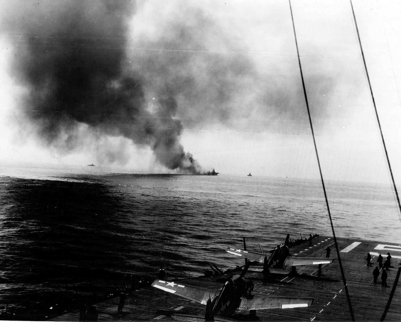 USS Bunker Hill (CV-17) burns after being hit by two kamikaze – 11 May 1945