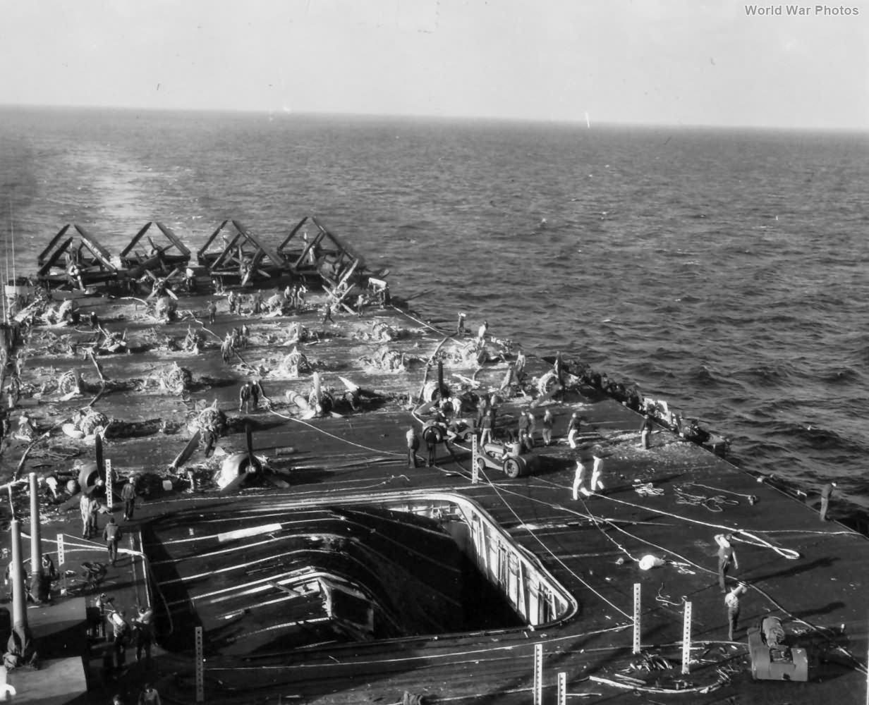 Deck of the aircraft carrier USS Bunker Hill covered with wreckage of destroyed planes