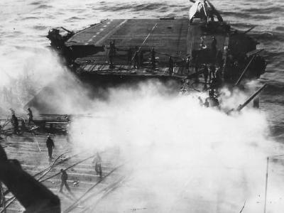 Aircraft carrier USS Enterprise CV-6 Hit by Japanese Kamikaze off Okinawa May 14, 1945