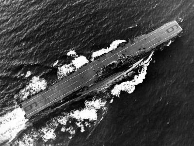 An overhead aerial view of the US Navy aircraft carrier USS Enterprise CV-6