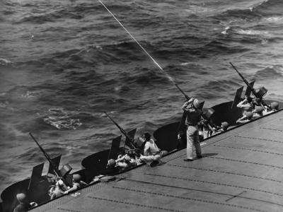 Gunnery practice on the 20 mm guns on the flight deck of the USS Enterprise