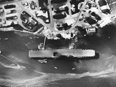 USS Enterprise anchored near Ford Island