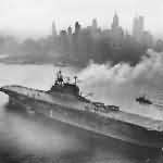 Aircraft carrier USS Enterprise CV-6 Passing Downtown New York City on Hudson River