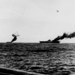 Belleau Wood and USS Franklin CV-13 on fire after attacks by Japanese suicide aircraft on October 30 1944