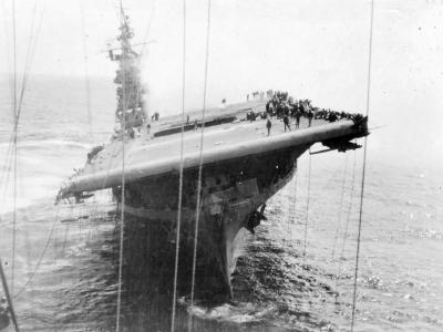 listing carrier USS Franklin CV-13 heads to New York alone