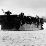 View of damage inflicted on USS Independence