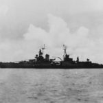 Heavy cruiser USS Indianapolis preparing to leave Tinian after delivering atomic bomb components 26 July 1945