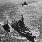 Escorted by the NICHOLAS DD 449 and followed by USS IOWA BB 61 USS MISSOURI BB 63 steams up Tokyo Bay on August 30th 1945