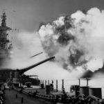 Battleship USS Iowa fires salvo from one of three 16 inch turret