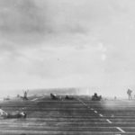 aircraft carrier USS Langley CVL-27 misses a close one