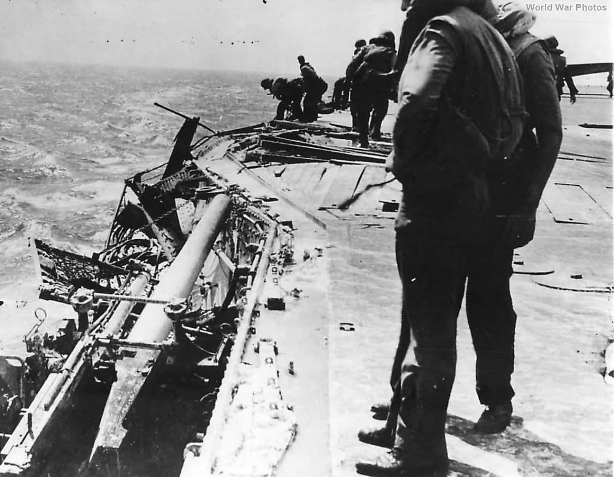 Crew inspects damage to gun gallery on USS Lexington during Battle of Coral Sea