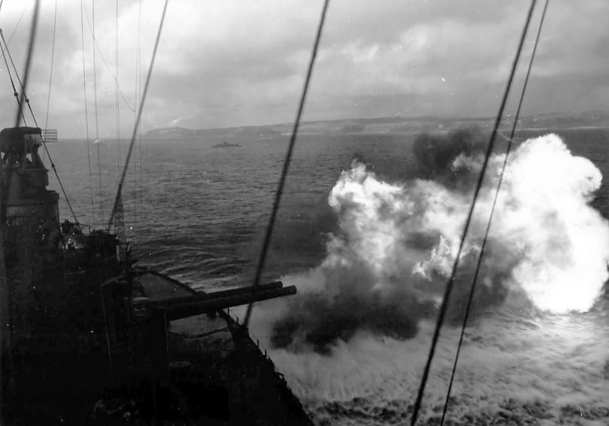 USS Maryland (BB-46) firing his main guns at Japanese target on Okinawa