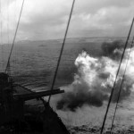 USS Maryland (BB-46) firing his main guns at Japanese target on Okinawa
