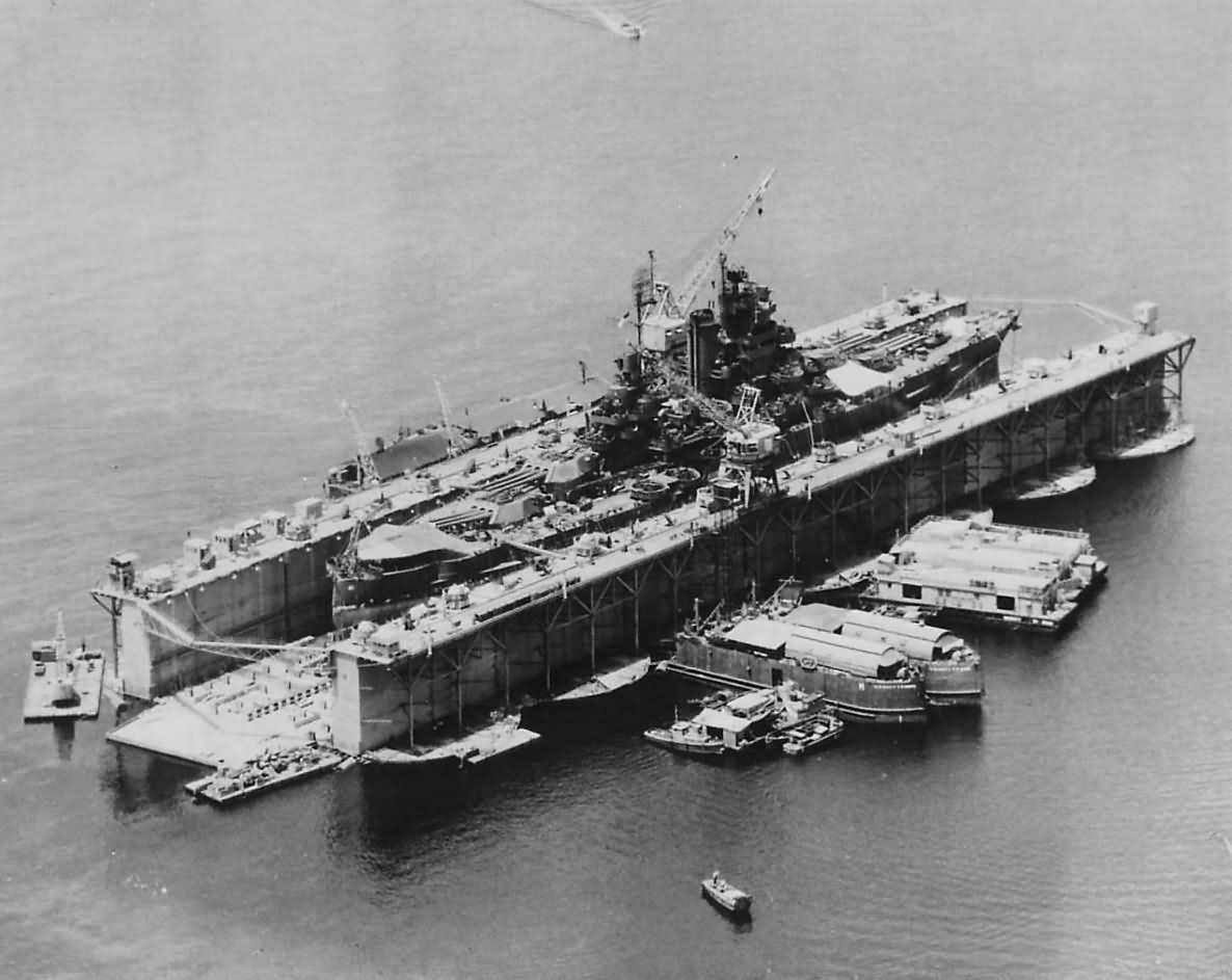USS ABSD-2 at Manus with battleship USS Mississippi BB-41 drydocked October 1944