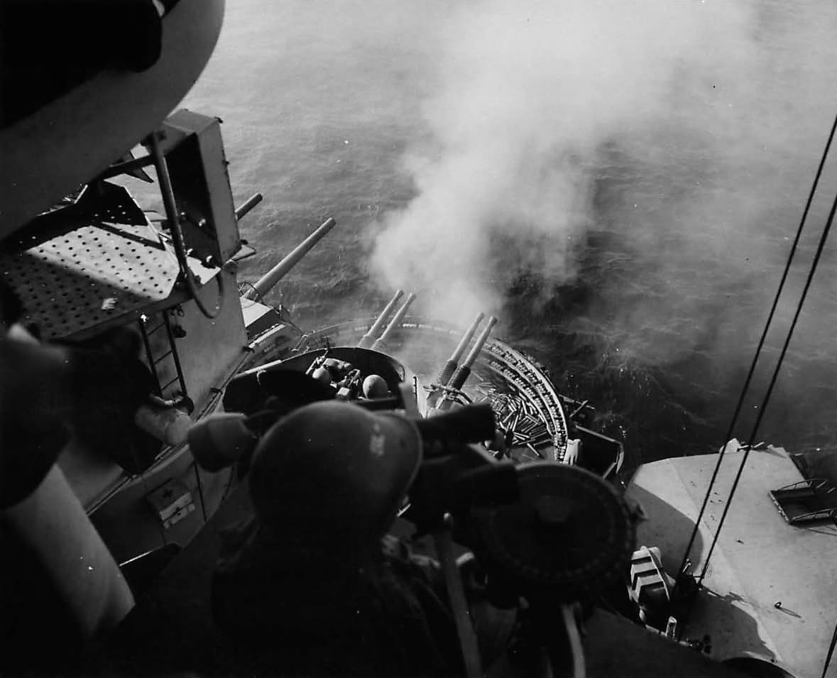 Bofors 40 mm guns of the battleship Nevada in action against attacking Japanese planes off Okinawa