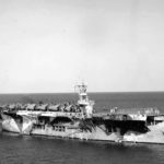 USS Santee (CVE-29) pictured at anchor in 1942