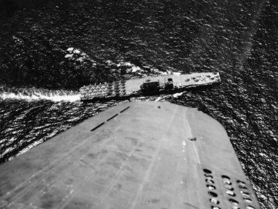 Aerial view of USS Saratoga en-route to Rabaul Island November 1943