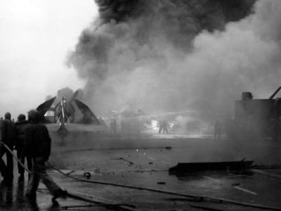 Fire fighteing detail, battling flames on the flight deck of the USS Saratoga