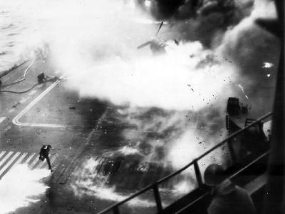 Firefighters aboard USS Saratoga (CV-3) fighting fires after Japanese attack