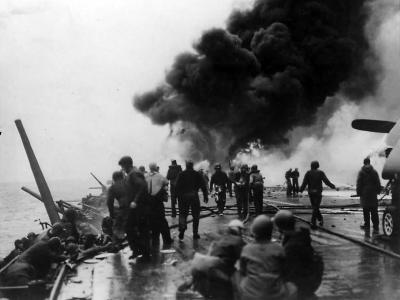 Fires aboard USS Saratoga (CV-3) after Kamikaze attack off Chichi Jima 21 February 1945