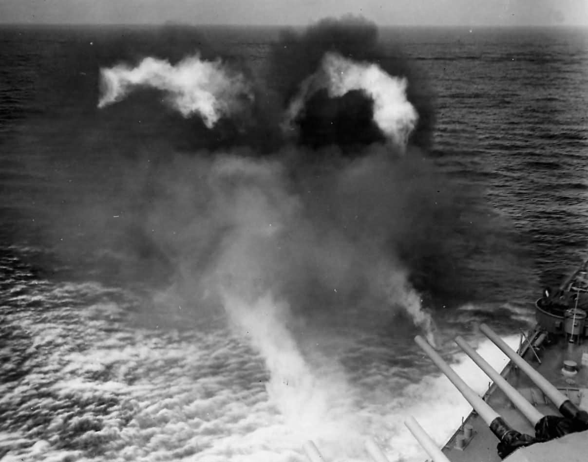16 Inch main batteries fire salvo from Battleship USS South Dakota BB-57 1943