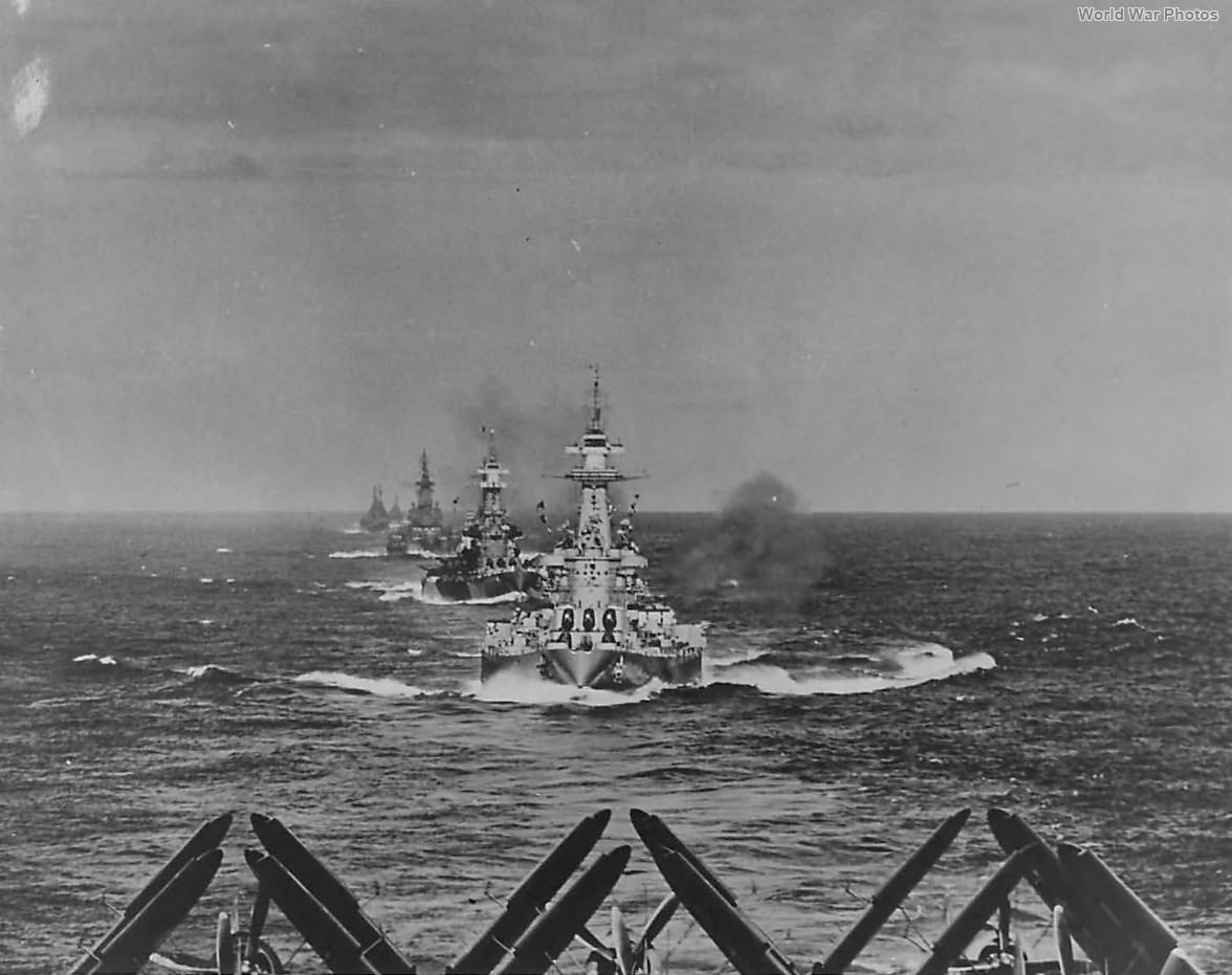 Ships of TF 38 steaming into Ulithi anchorage Battleships USS Washington, USS North Carolina and USS South Dakota