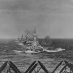 Ships of TF 38 steaming into Ulithi anchorage Battleships USS Washington, USS North Carolina and USS South Dakota