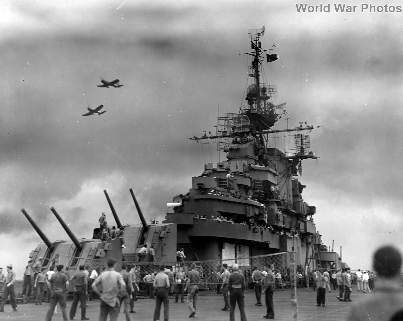 Sailors play volleyball on the flight deck of USS Wasp in 1945
