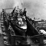 Battleship USS West Virginia in the ABSD floating drydock at Espiritu Santo November 1944