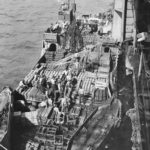 LCT loaded with ammo alongside USS Yorktown 1945