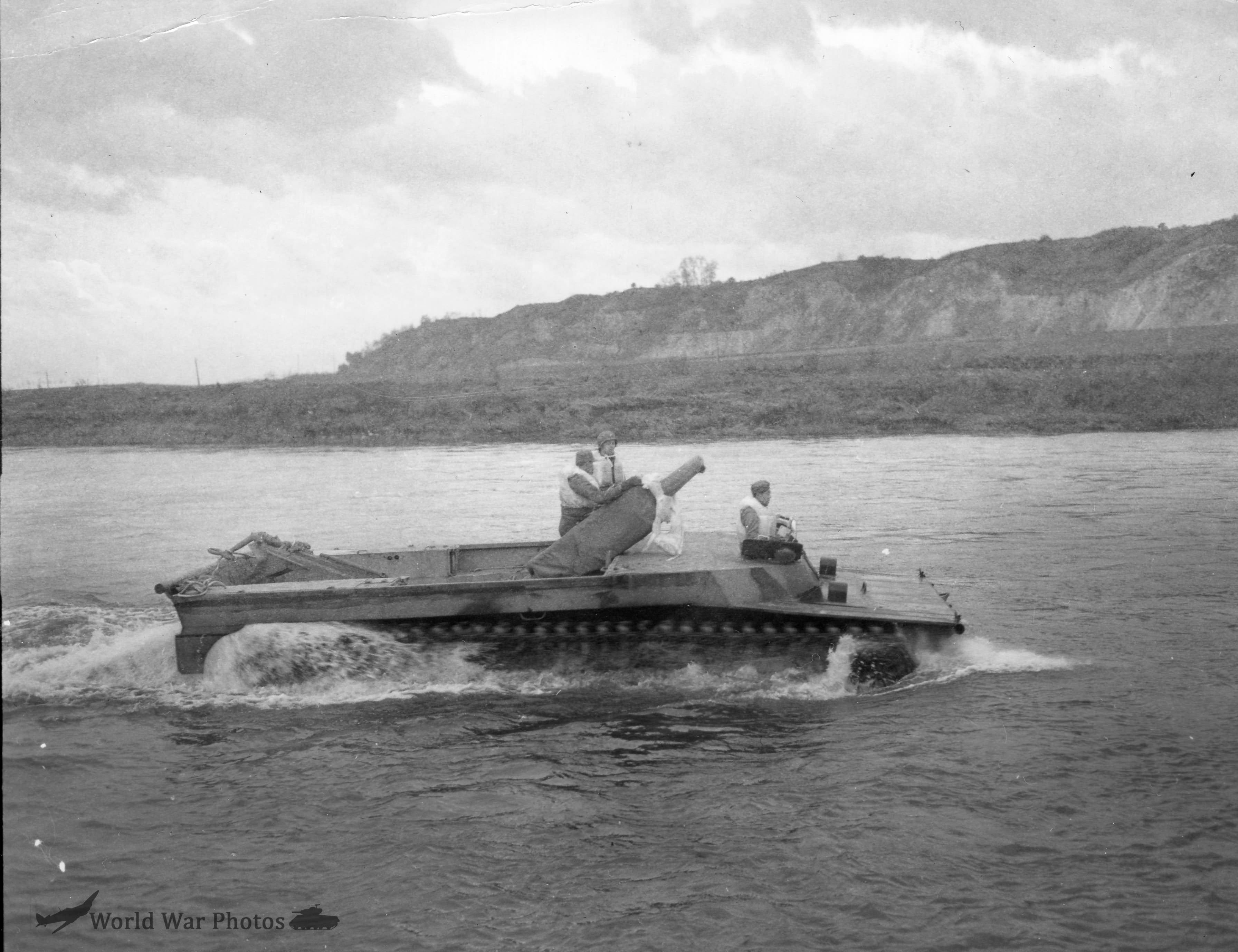 LVT-4 carrying 105mm howitzer and 55 sandbags