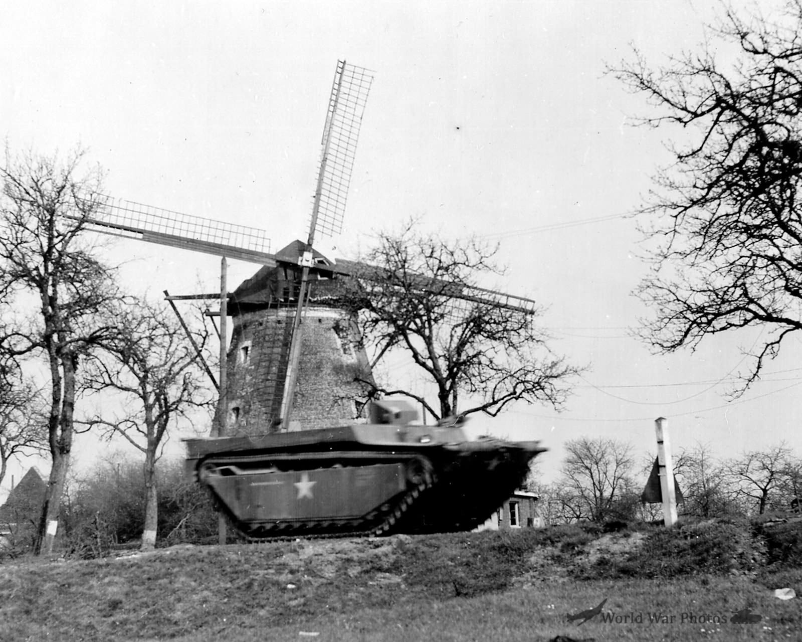 LVT Buffalo Amtrac by Windmill along Rhine River March 45 9th army