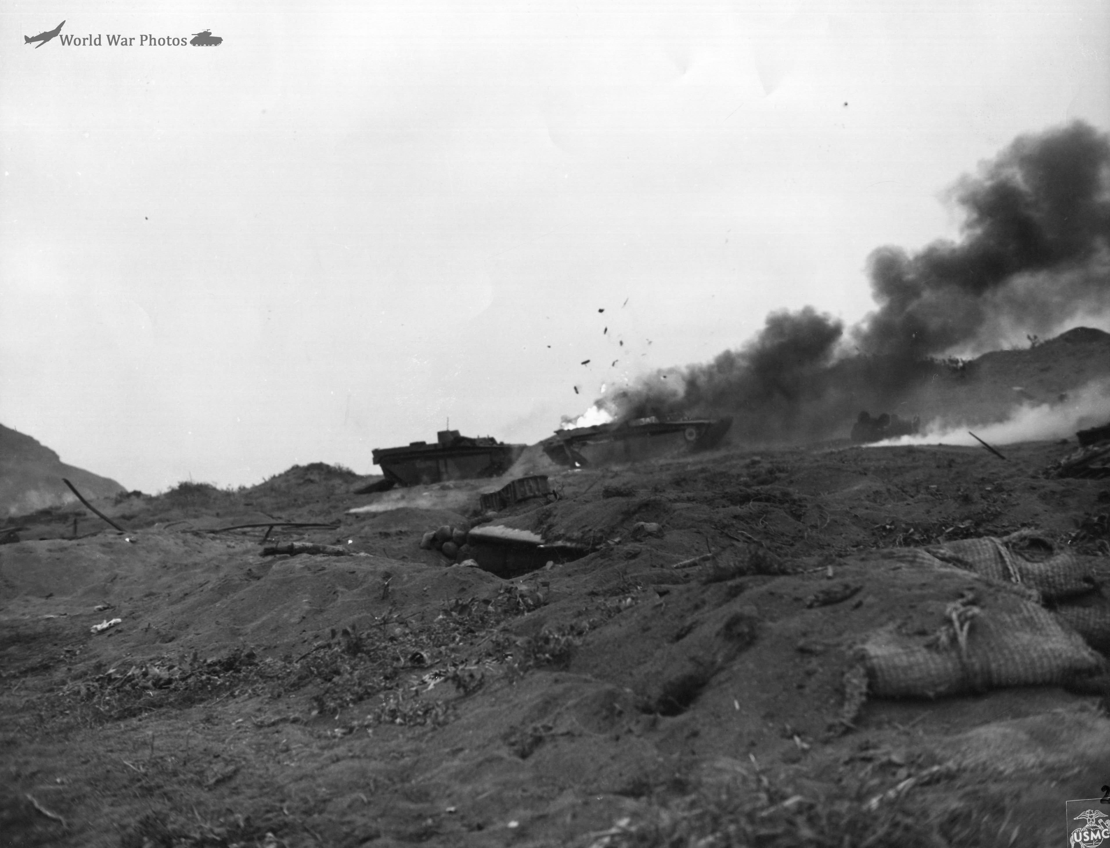LVTs and a jeep victims of Japanese mortar fire on the Iwo Jima beachhead