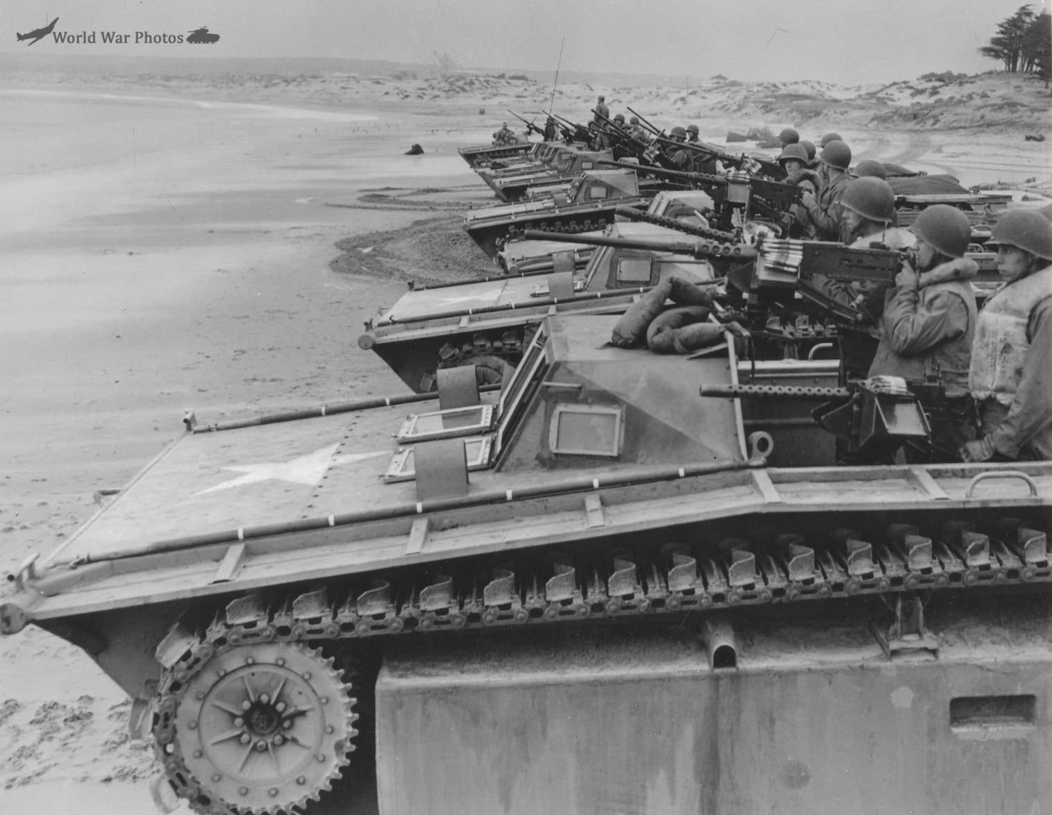 LVTs at beach maning machine guns