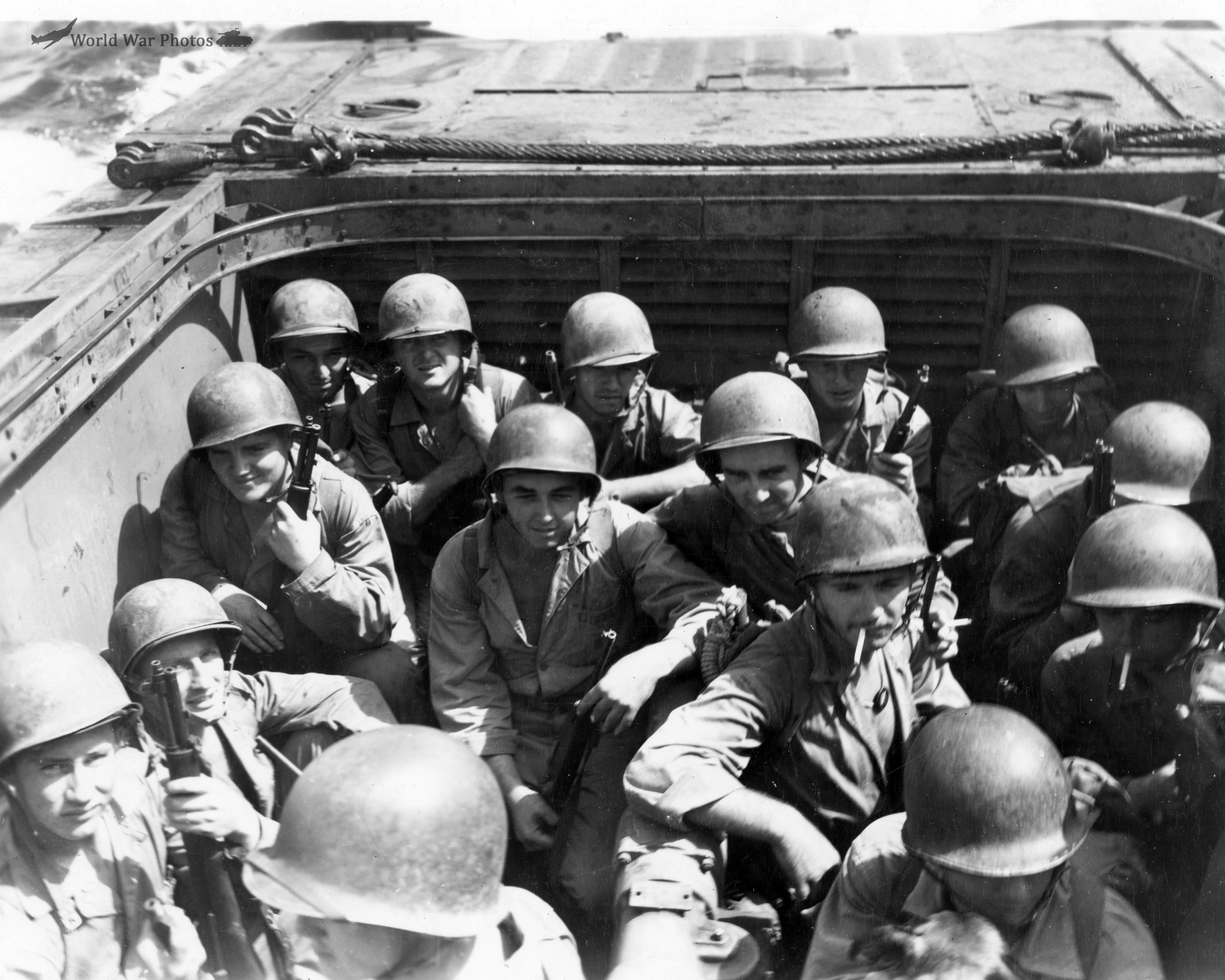 Marines down low in Alligator waiting to hit the beach