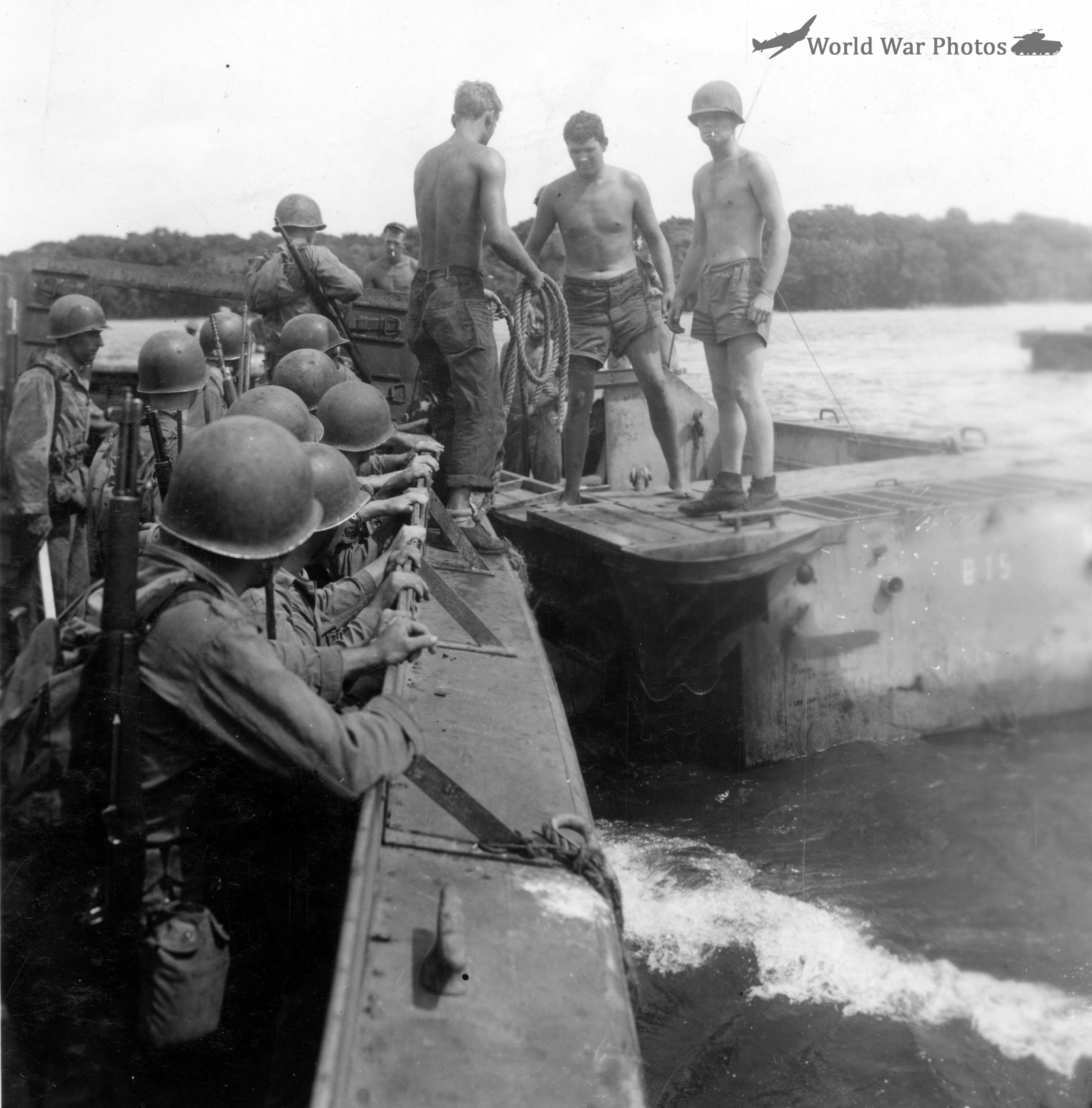 Transferring from Higgins Boats to amphibious tractors Guadalcanal 10 March 1944