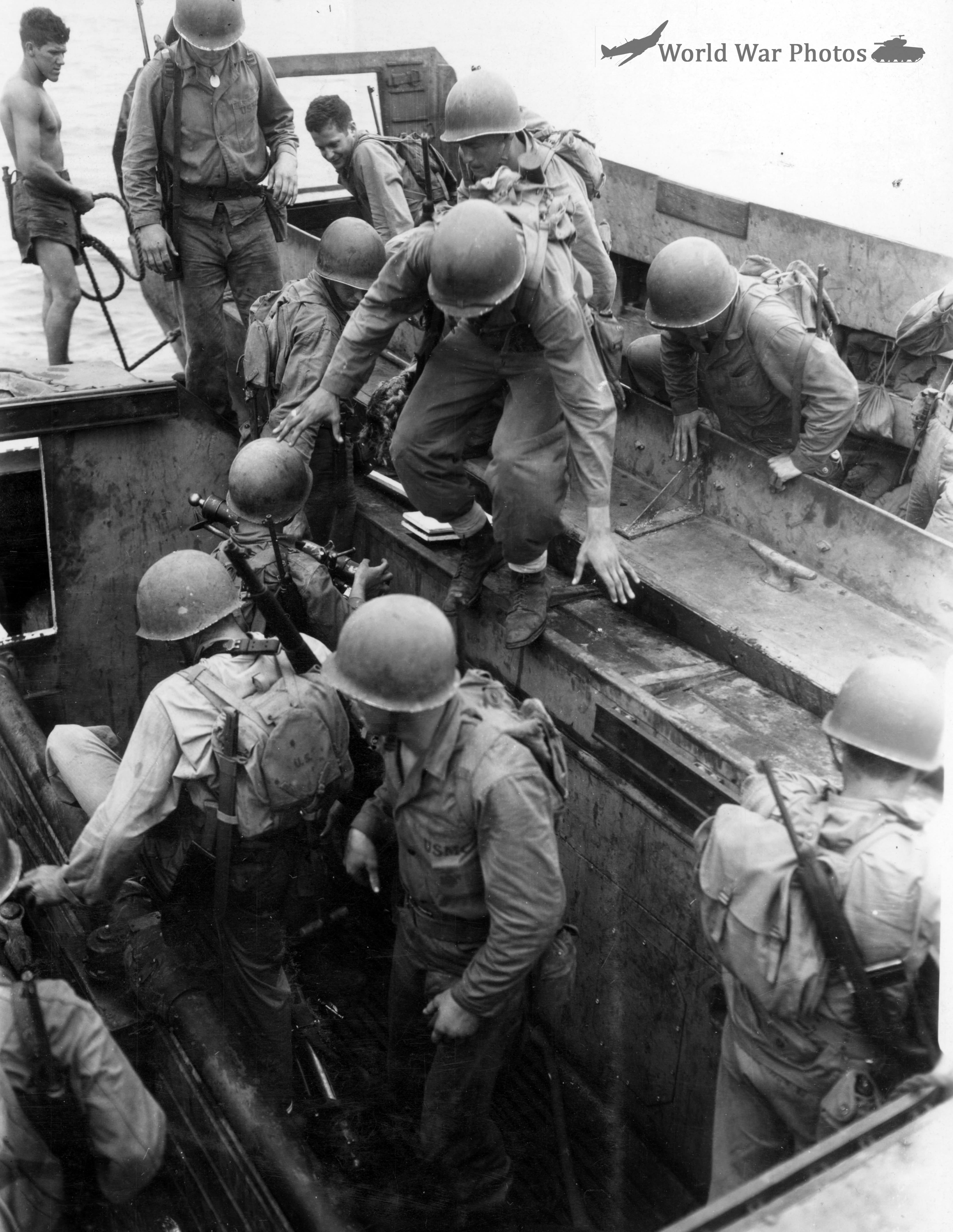 Transferring from Higgins Boats to amphibious tractors Guadalcanal 10 March 1944