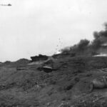LVTs and a jeep victims of Japanese mortar fire on the Iwo Jima beachhead