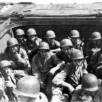 Marines down low in Alligator waiting to hit the beach