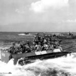 Men of 7th Infantry Division head for the beaches of Okinawa in LVT-4