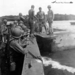 Transferring from Higgins Boats to amphibious tractors Guadalcanal 10 March 1944