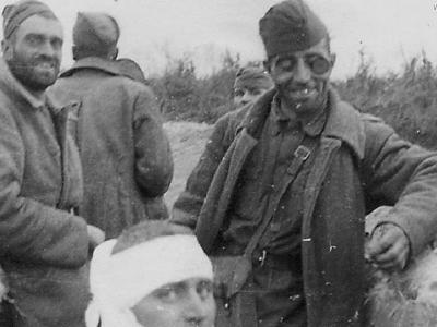 Group captured battered Russian POWs in trenchline