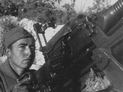 Soviet soldier manning AA MG 13