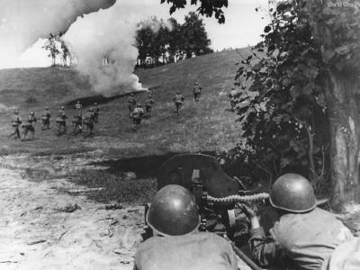 Under cover of MG fire Soviet soldiers storm enemy positions somewhere allong the Russian Front