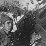 Soviet soldier manning AA MG 13