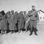 Wehrmacht Guard posed with Russian POW column
