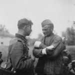 Wehrmacht Landser and wounded POW