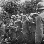 Wehrmacht soldiers with Soviet POW