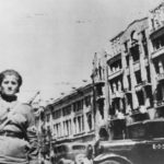 Woman military police direct traffic in Kharkov 1943