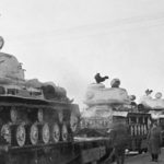IS-2 tanks loaded onto a flatbed railway cars